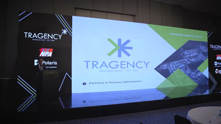 The Tragency screen on stage at TPC 2026
